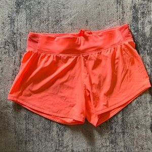 Under Armour Women's Bright Orange Athletic Shorts